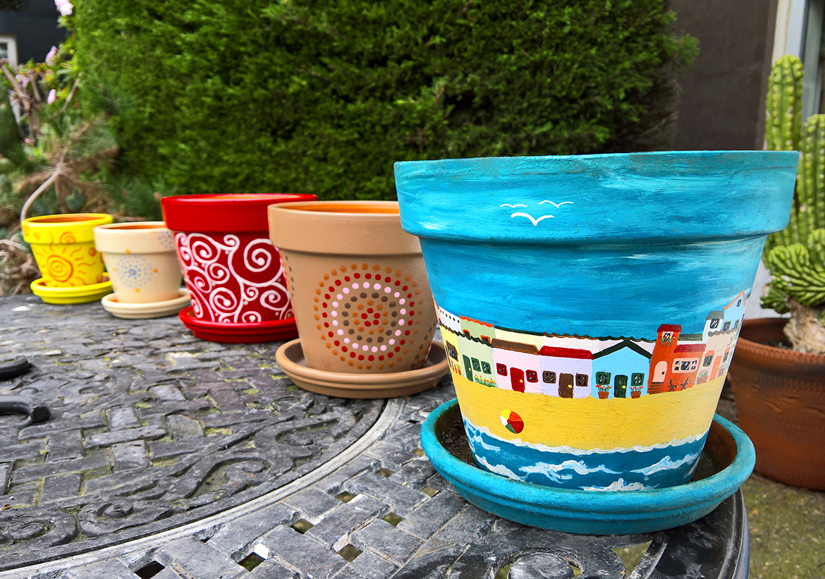 Hand-Painted Terracotta Pots inspired by Earth and Life